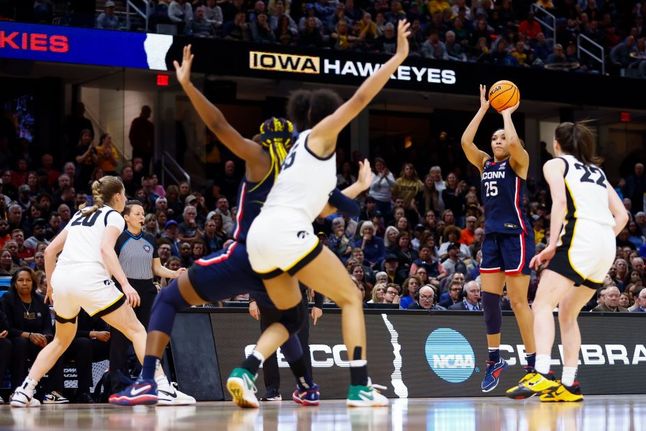 Ice Brady of the UConn Huskies shoots the ball.