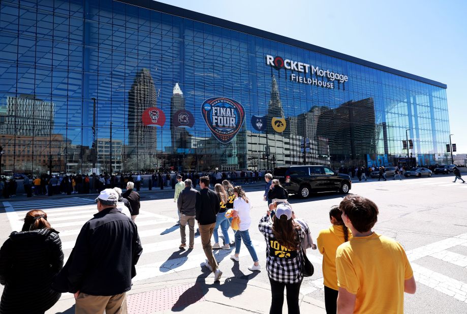 Fans arrive at Rocket Mortgage FieldHouse ahead of the national championship game between the Hawkeyes and the Gamecocks.