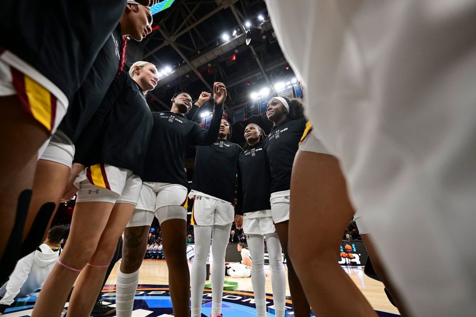 South Carolina players huddle before the game.