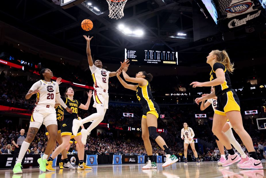 MiLaysia Fulwiley shoots over Iowa's Hannah Stuelke.