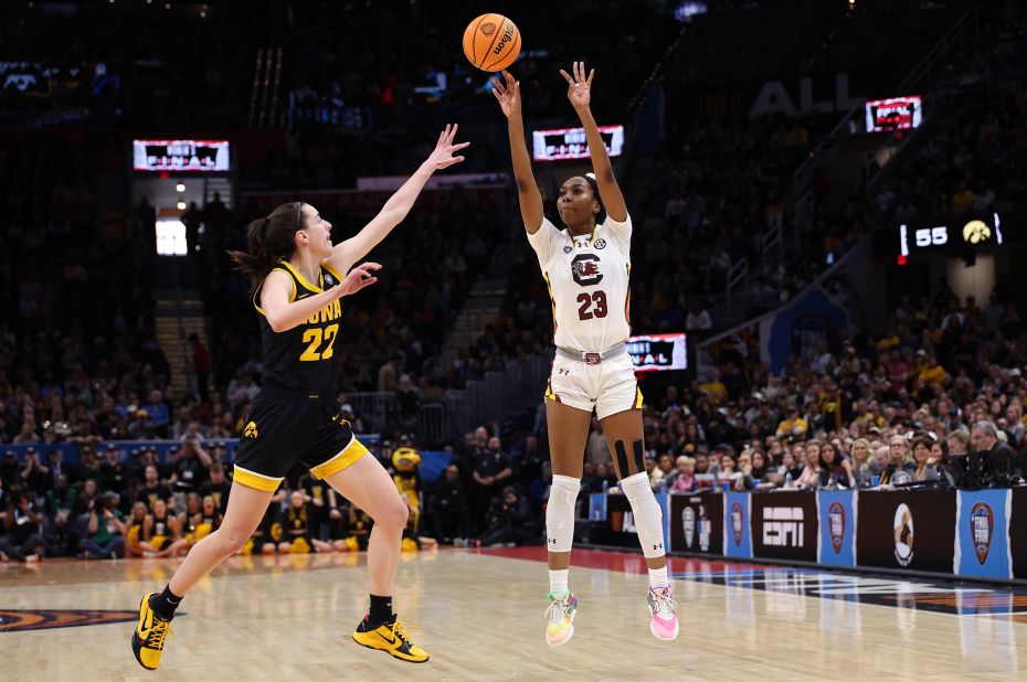 South Carolina's Bree Hall shoots a three point basket over Clark.