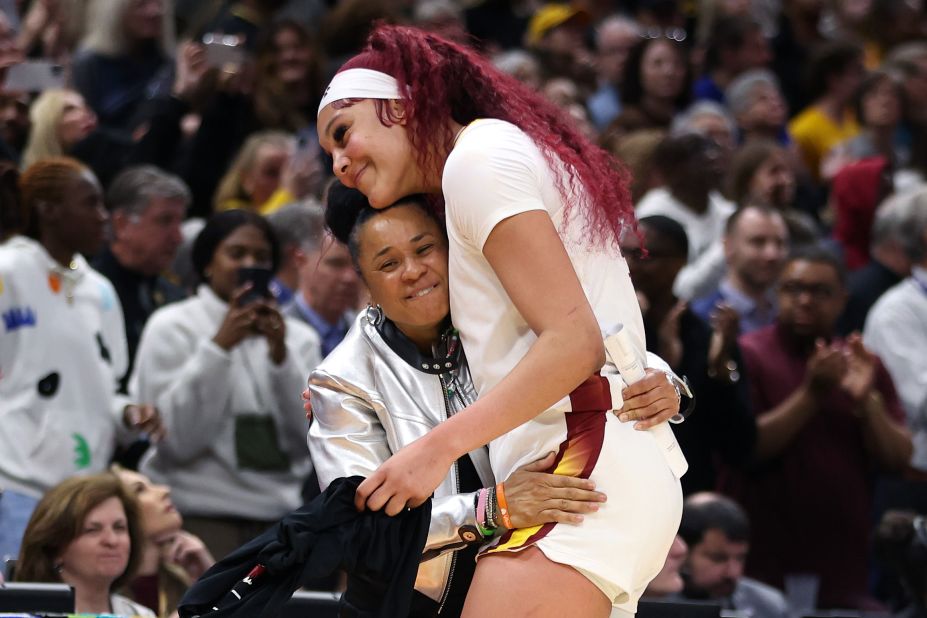 Staley hugs Kamilla Cardoso after the game.