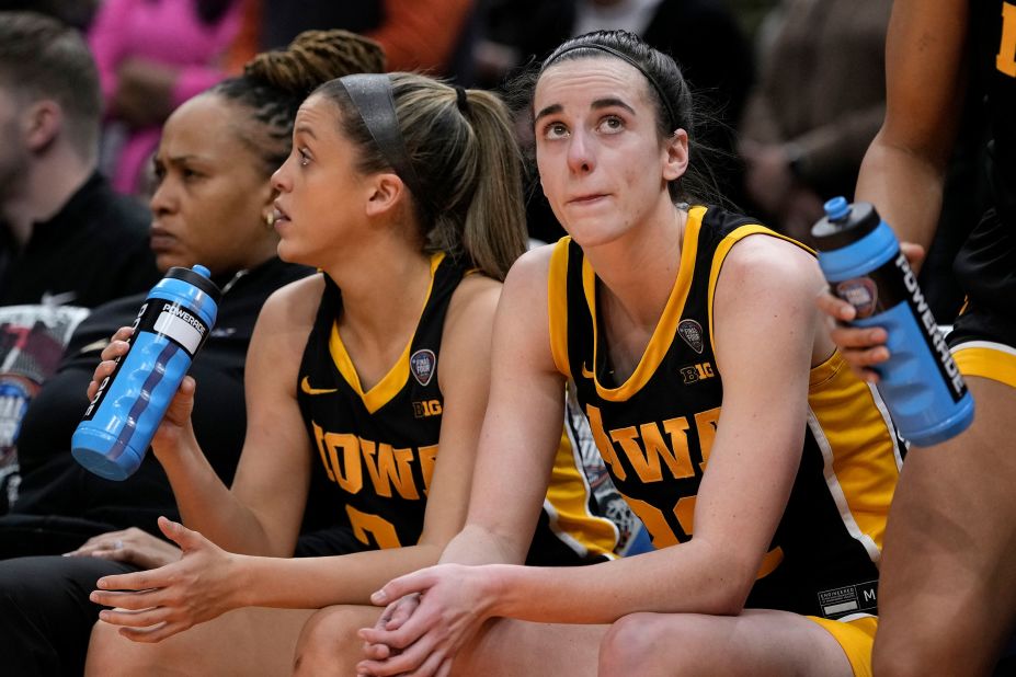 Clark sits on the bench at the end of the game.