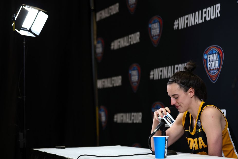 Iowa guard Caitlin Clark speaks with the media after the game.