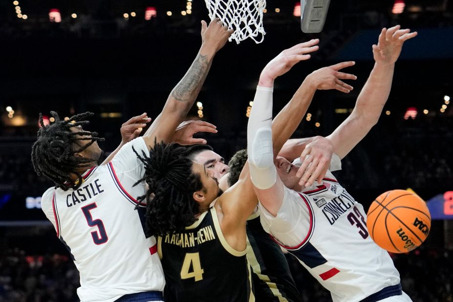 UConn and Purdue players vie for the ball in the first half.