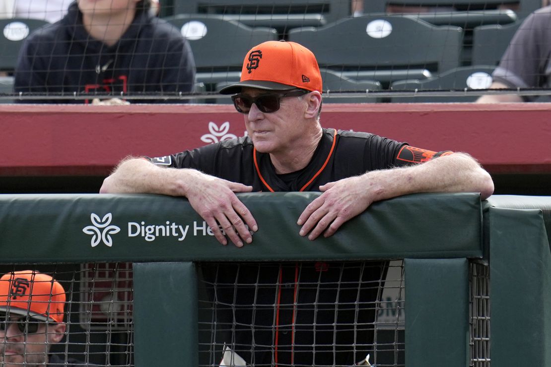 Melvin watches his players during the first inning of a Spring Training game.