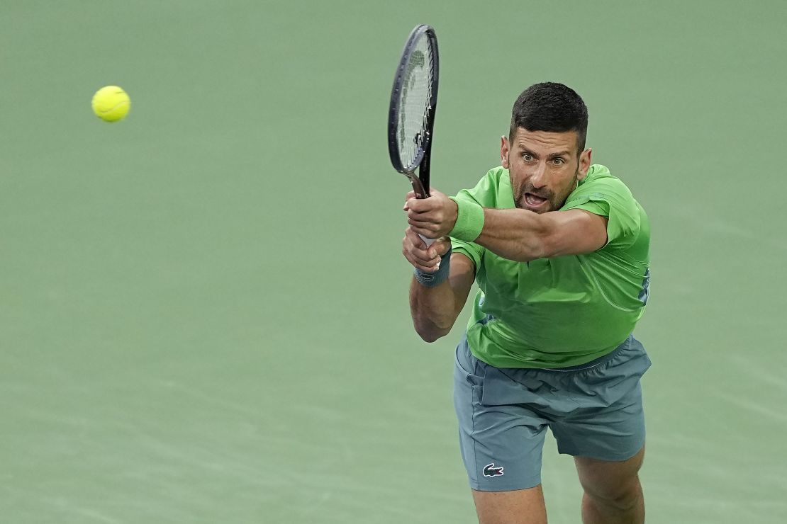 Djokovic returns a shot against Nardi.