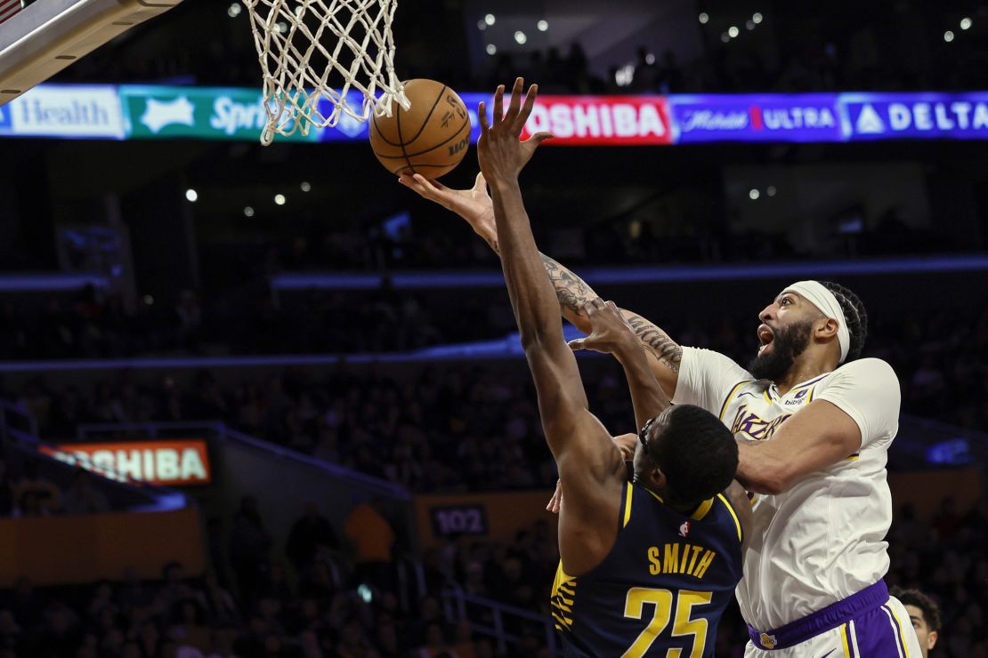 Davis drives to the hoop during the game.