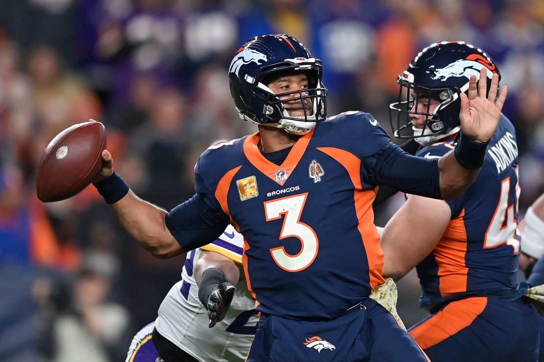 Wilson throws a deep pass during the second quarter of the Broncos' game against the Minnesota Vikings on November 19, 2023.