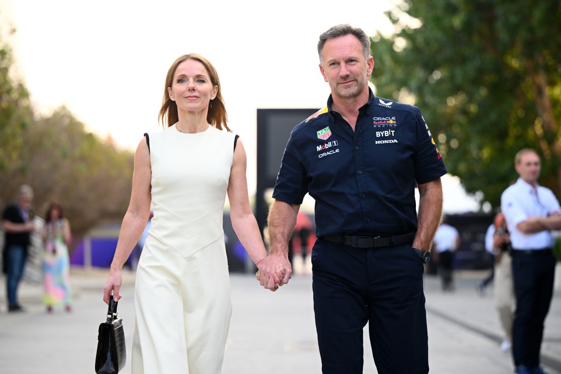 Christian Horner and Geri Halliwell-Horner walk in the paddock in Bahrain.