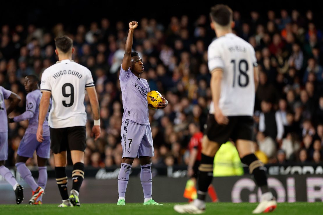 Vinícius Jr. celebrates a goal against Valencia.