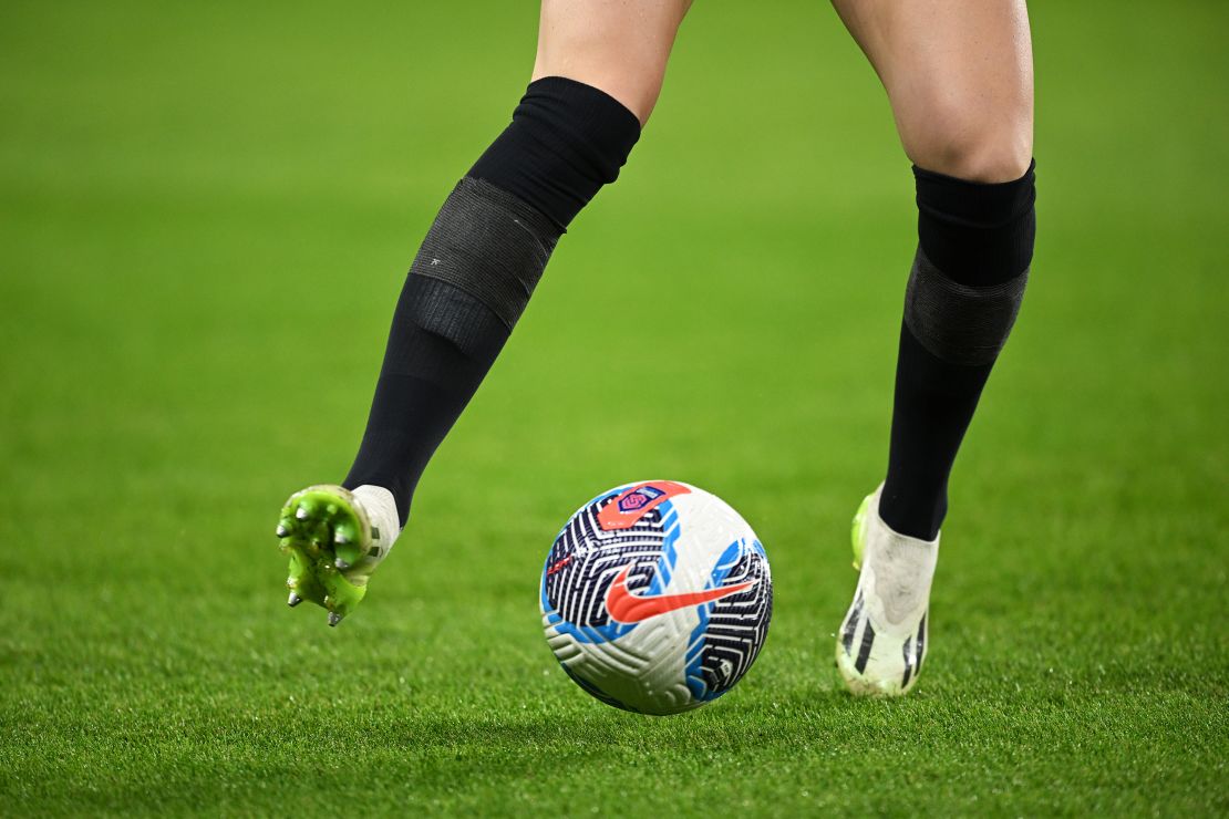 LONDON, ENGLAND - MARCH 15: An Arsenal player warms up with a black pair of socks after being forced to change colour socks which results in a delayed kick off time prior to the Barclays WomenÂ´s Super League match between Chelsea FC and Arsenal FC at Stamford Bridge on March 15, 2024 in London, England. (Photo by Justin Setterfield/Getty Images)