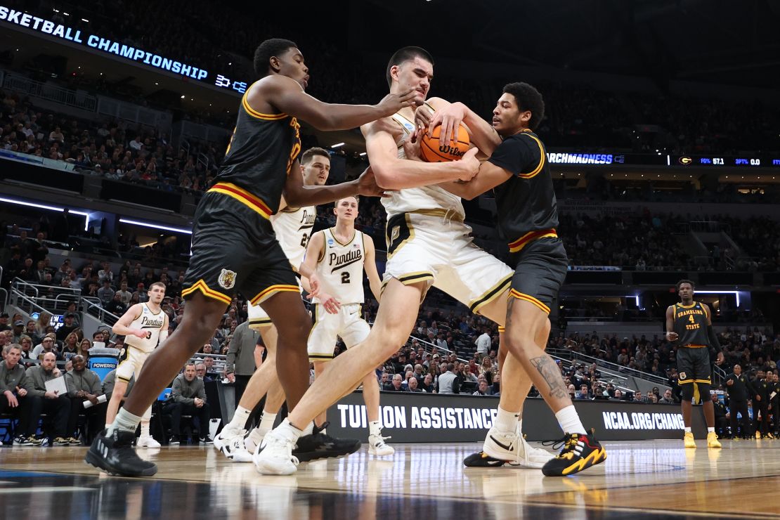 Edey fights for a rebound with Jimel Cofer of the Grambling State Tigers during the first half.