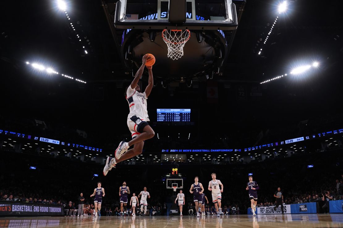 Newton scores a basket on a fast break during the second half against the Northwestern Wildcats in the second round of March Madness.