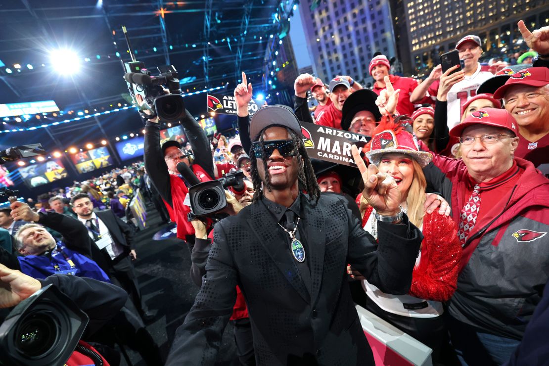 Marvin Harrison Jr. celebrates after being selected by the Arizona Cardinals.