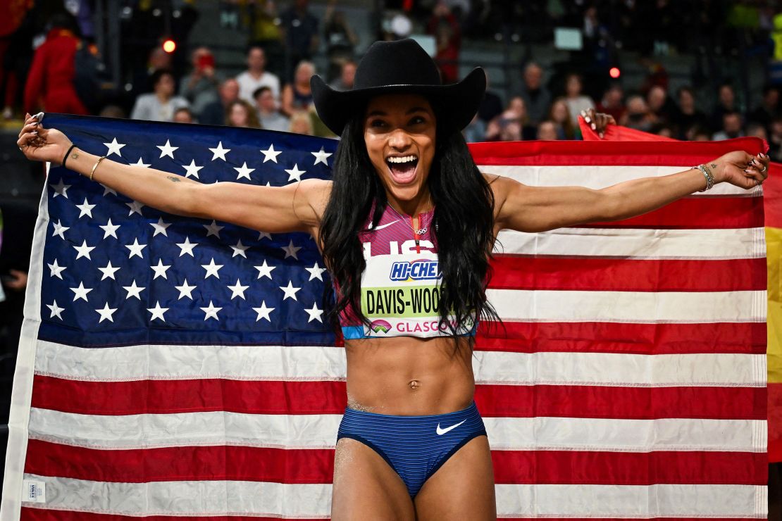 Davis-Woodhall celebrates her victory at the indoor world championships in Glasgow, Scotland.