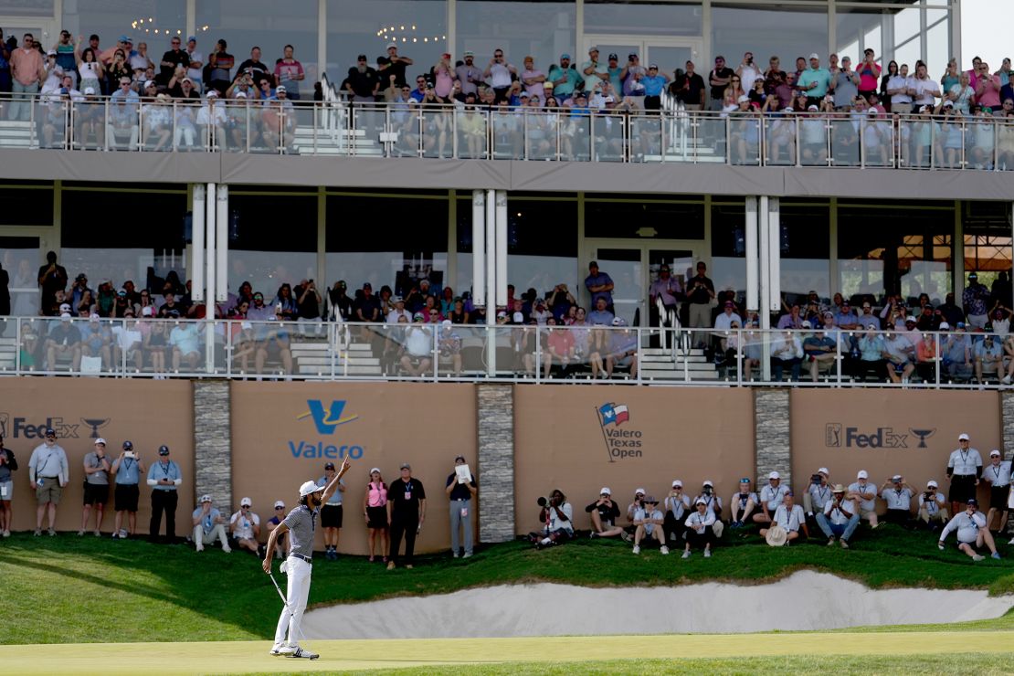 Bhatia celebrates the birdie putt that forced McCarthy into a playoff, dislocating his shoulder in the process.