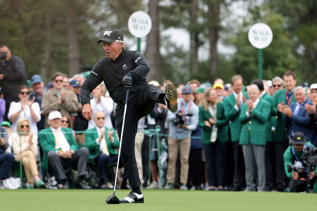 Player toasts his tee shot with his trademark celebration.