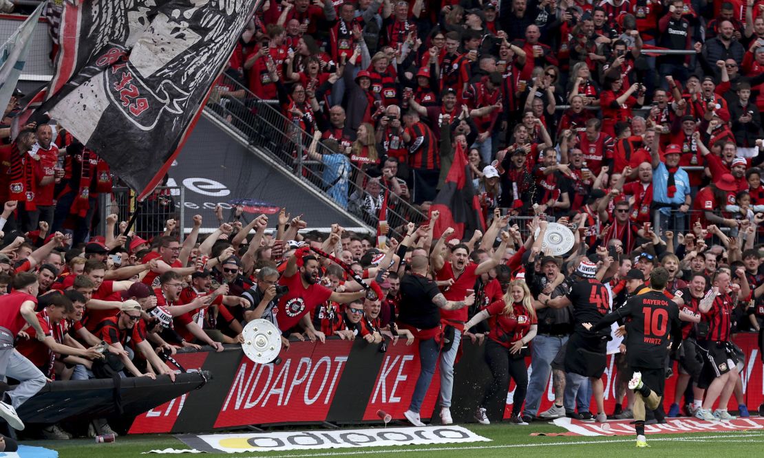 Wirtz and Leverkusen fans celebrate after the German international scored the team's fourth goal against Werder Bremen.