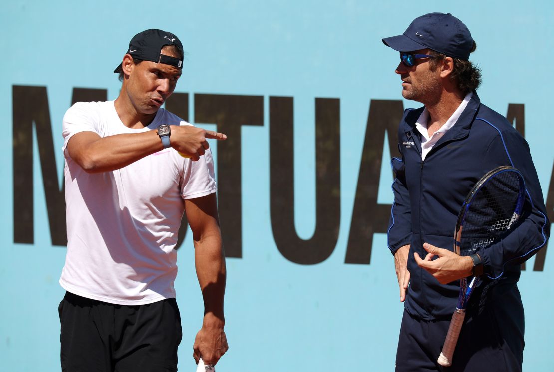 Nadal speaks to coach Carlos Moyá as he prepares to compete at the Madrid Open.