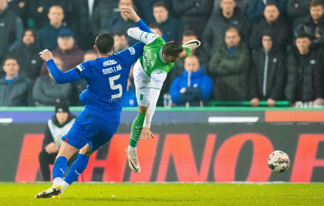 Hibernian's Martin Boyle collides with Rangers' John Souttar before going down injured during a Scottish Cup quarterfinal match between Hibernian and Rangers at Easter Road Stadium, on March 10, 2024, in Edinburgh, Scotland.