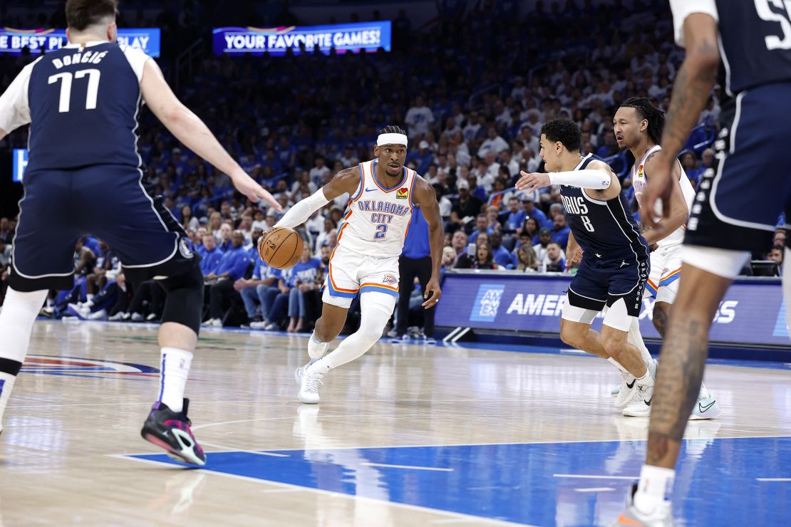 Gilgeous-Alexander dribbles during the game.