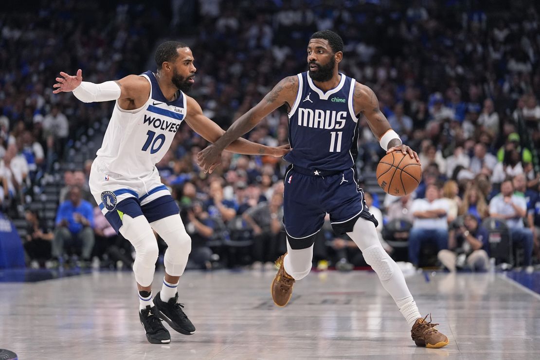 Irving (right) scored 14 of his 33 points in the fourth quarter against the Timberwolves.