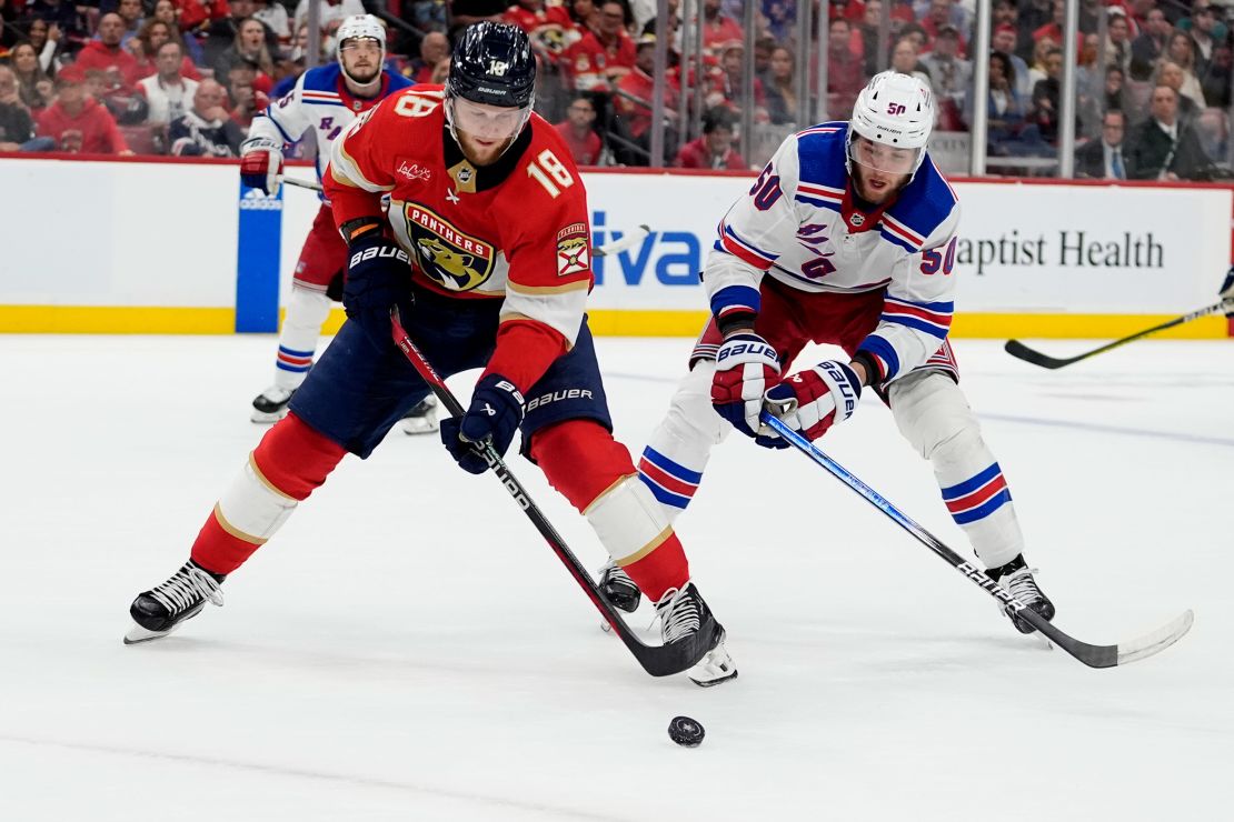 Florida Panthers center Steven Lorentz skates with the puck as New York Rangers left wing Will Cuylle defends during Game 6 in the Eastern Conference finals of the NHL hockey Stanley Cup playoffs in Sunrise, Florida on Saturday.