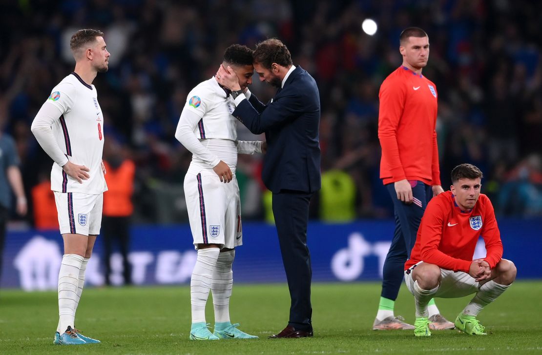 Southgate consoles Jadon Sancho after the Euro 2020 final.