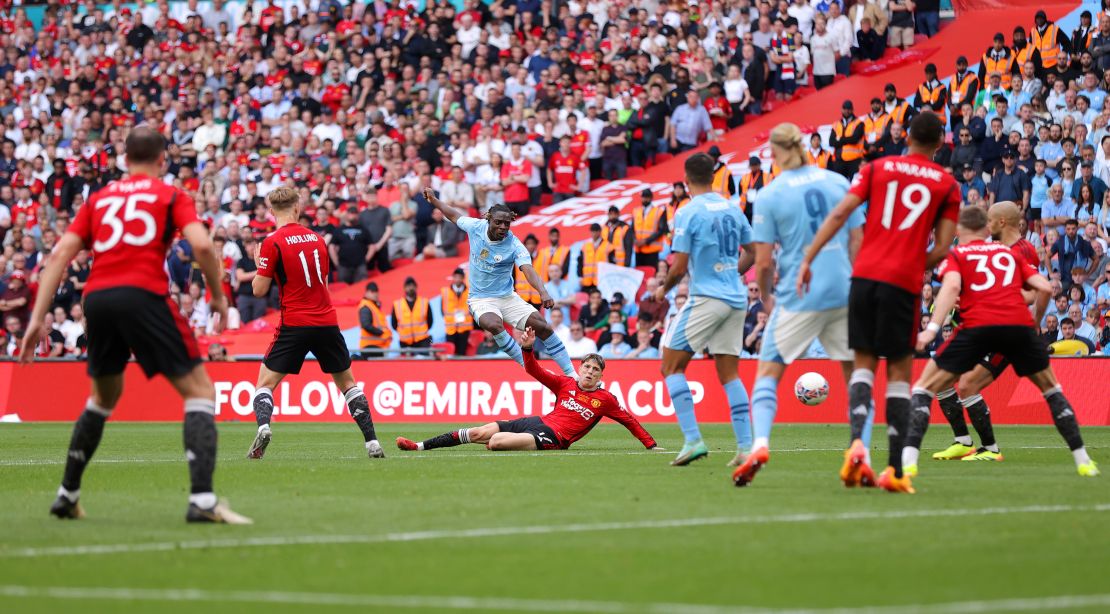 Jeremy Doku scored a late goal for Manchester City to set up a grandstand finish.