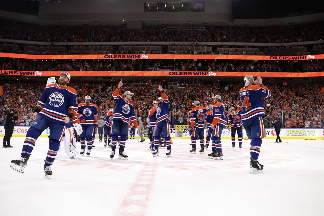 Oilers players celebrate their victory in game six of the Western Conference Finals.