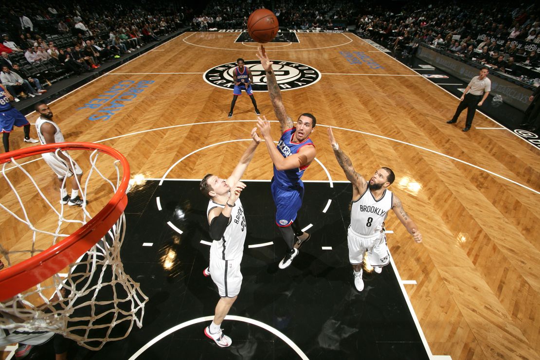 Drew Gordon taking a shot against the Brooklyn Nets while a member of the Philadelphia 76ers on October 20, 2014.