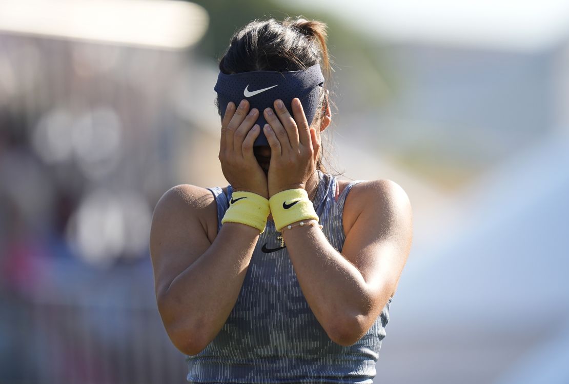 Raducanu reacts after winning the match.