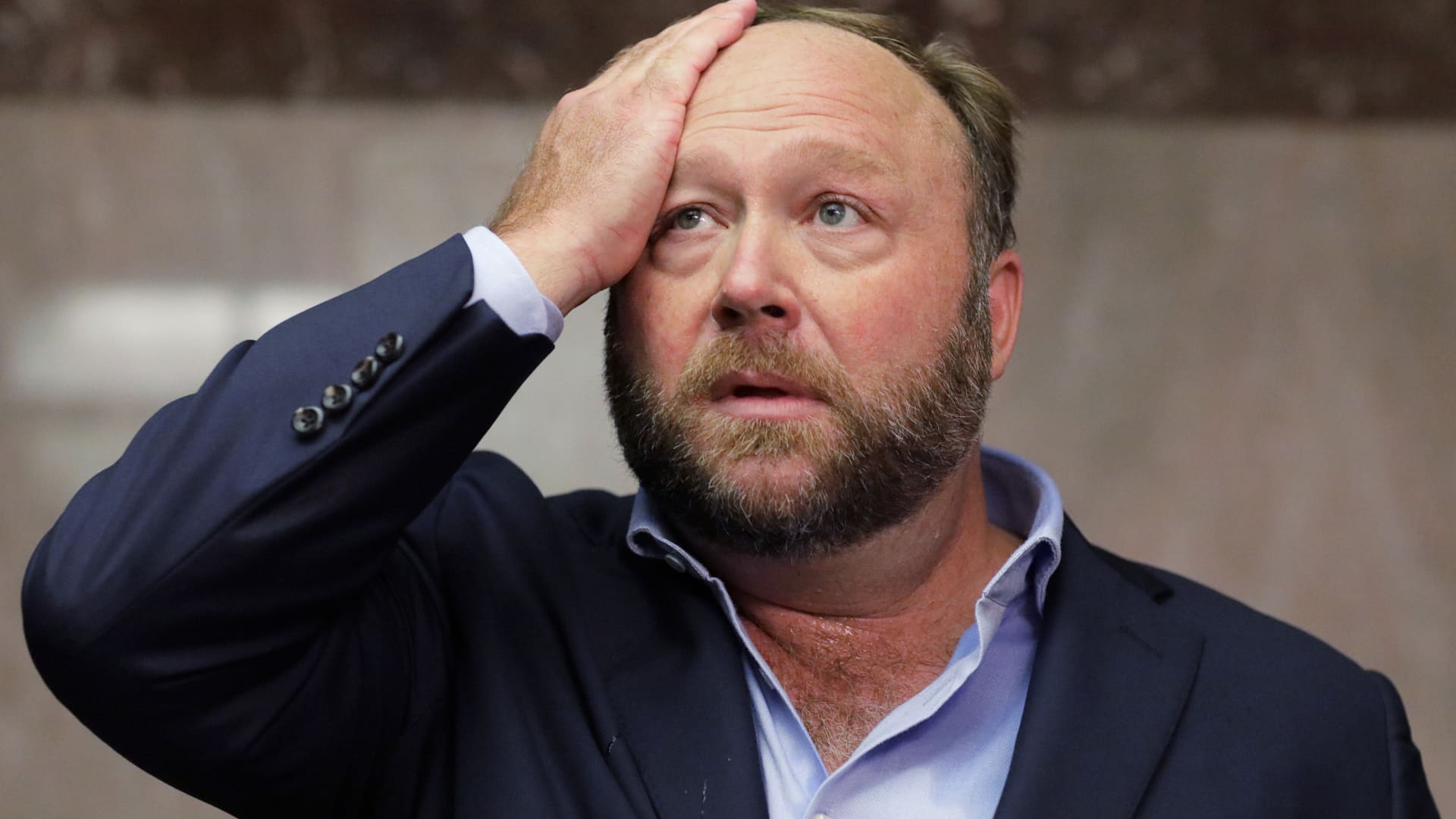 Infowars host Alex Jones’ personal assets to be sold to help pay Sandy Hook debt, judge rules