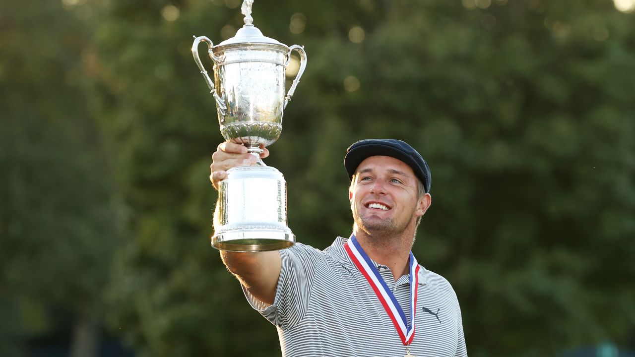 MAMARONECK, NEW YORK - SEPTEMBER 20: Bryson DeChambeau of the United States celebrates with the championship trophy after winning the 120th U.S. Open Championship on September 20, 2020 at Winged Foot Golf Club in Mamaroneck, New York. (Photo by Gregory Shamus/Getty Images)