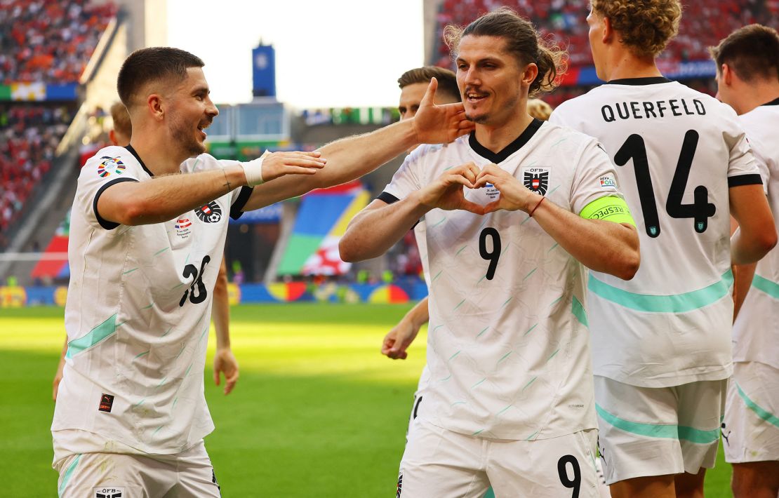 Sabitzer celebrates his winning goal.