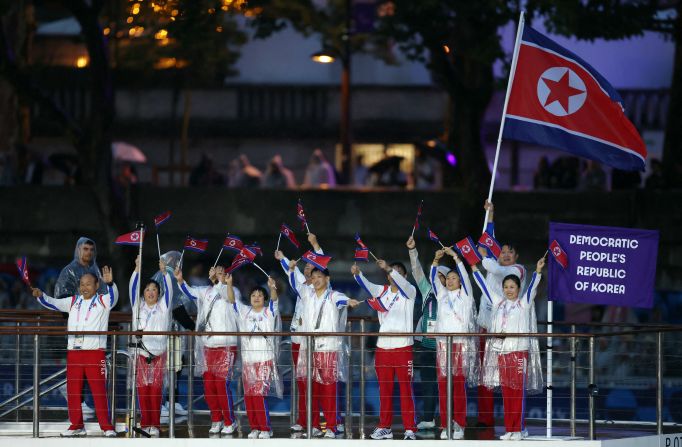 North Korean athletes wave during the Parade of Nations. North Korea <a href="https://www.cnn.com/2021/09/08/sport/north-korea-beijing-olympics-intl-hnk-spt/index.html">was barred from competing at the 2022 Winter Olympics in Beijing</a> as part of its punishment for its “unilateral decision” to drop out of the Summer Games in Tokyo in 2021.