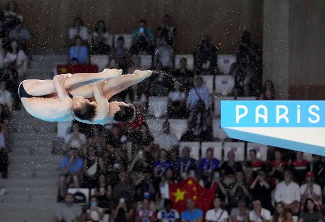 Chinese divers Lian Junjie and Yang Hao compete in the synchronized 10-meter platform event on July 29. The duo <a href="https://www.cnn.com/sport/live-news/paris-olympics-news-2024-07-29#h_1b74e8a24710ae8d977ed3ee2a39aa47">recorded the highest score</a> in every round to win the gold medal.