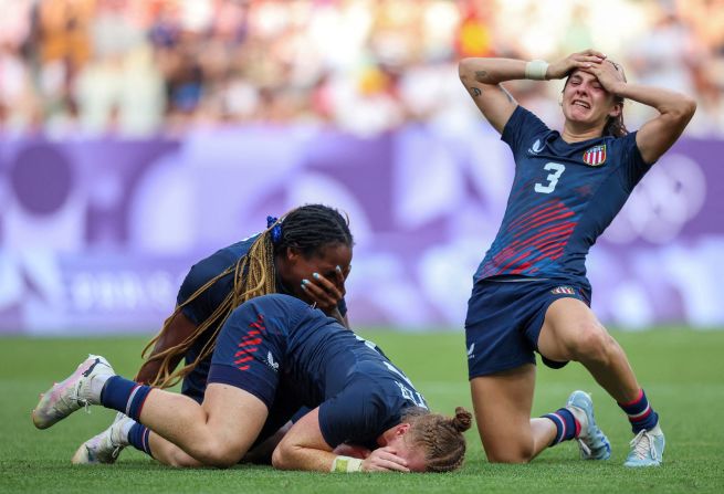 The United States' Naya Tapper, Alev Kelter and Kayla Canett celebrate after their team finished a <a href="https://www.cnn.com/sport/live-news/paris-olympics-news-2024-07-30#h_a8e7c39d4a65b9cf1b5bb249e6971af3">stunning comeback to defeat Australia</a> and win bronze in rugby sevens on July 30. It is the the United States' first-ever Olympic medal in the sport — for either men or women.