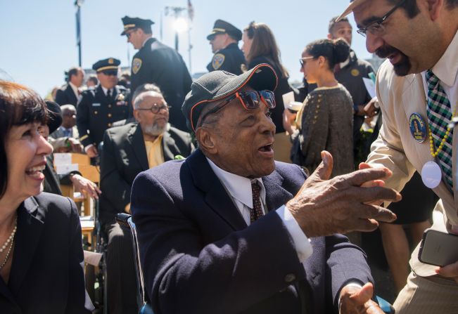 Mays greets VIP attendees during the inauguration ceremony for Mayor London Breed on the steps of City Hall in San Francisco, California on July 11, 2018.