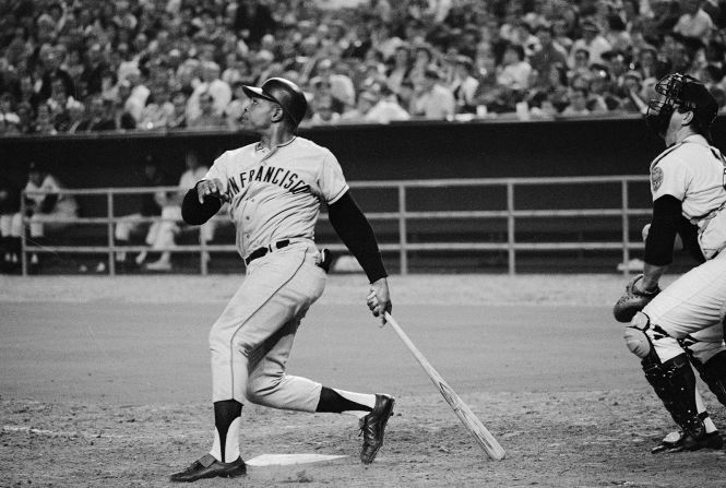 Mays watches the ball he had just hit go over the left field fence at the Astrodome in Houston, Texas, on April 24, 1966. The home run was May's 511th in his National League career and tied a record held by the late Mel Ott.