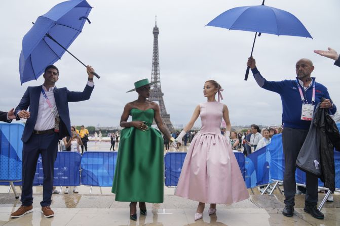 Entertainers Cynthia Erivo, center left, and Ariana Grande arrive for the opening ceremony.