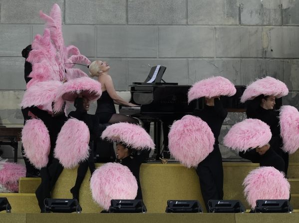 Lady Gaga performs during the ceremony. <a href="https://www.cnn.com/sport/live-news/paris-olympics-2024-opening-ceremony-seine#h_8fc6acef53f5652399ccbe46b1c0fffe">She had a fresh take</a> on the song “Mon truc en plumes” by iconic French artist Zizi Jeanmaire.