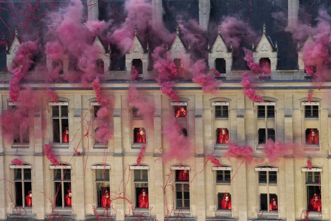 The opening ceremony <a href="https://www.cnn.com/sport/live-news/paris-olympics-2024-opening-ceremony-seine#h_70a19b7538b2f683ea78529e96900e99">depicted scenes from the French Revolution</a>. Here, smoke billows near windows at the Conciergerie, the site where Marie Antoinette, the last French queen prior to the revolution, was imprisoned.