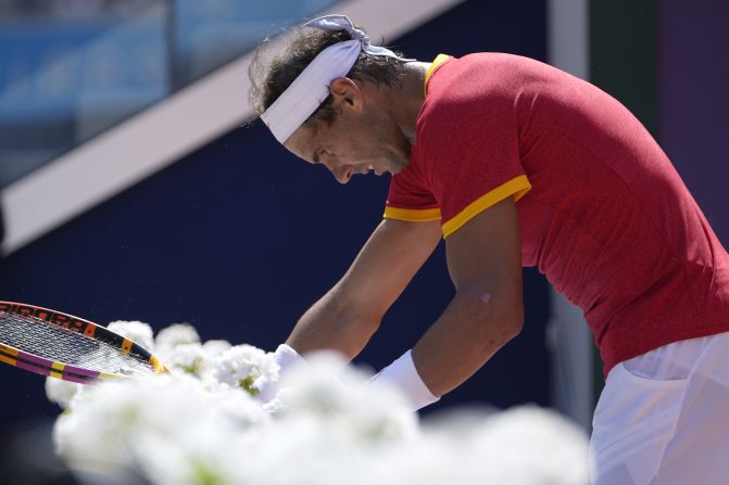 Spain's Rafael Nadal reacts while playing Serbia's Novak Djokovic in a second-round match at the Paris Olympics on Monday, July 29. Djokovic defeated his longtime rival in an <a href="https://www.cnn.com/sport/live-news/paris-olympics-news-2024-07-29#h_1ed80ed5abf02b17471e4d6c7a8aec81">epic showdown</a>, winning 6-1, 6-4.