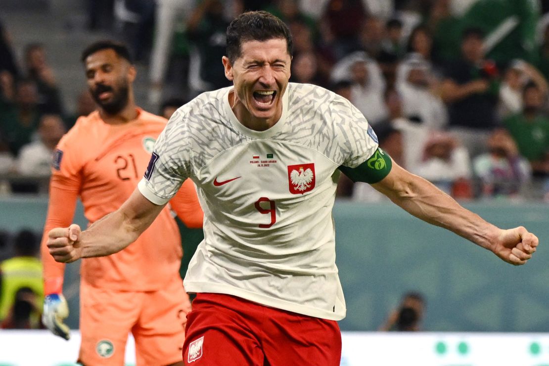 TOPSHOT - Poland's forward #09 Robert Lewandowski celebrates scoring his team's second goal during the Qatar 2022 World Cup Group C football match between Poland and Saudi Arabia at the Education City Stadium in Al-Rayyan, west of Doha on November 26, 2022. (Photo by ANDREJ ISAKOVIC / AFP) (Photo by ANDREJ ISAKOVIC/AFP via Getty Images)