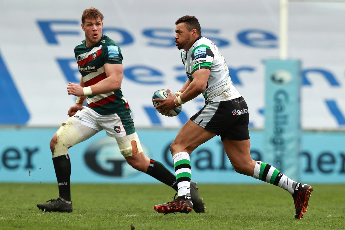 Burrell carries the ball during his time at Newcastle Falcons - he was found to be a victim of racism while at the club.