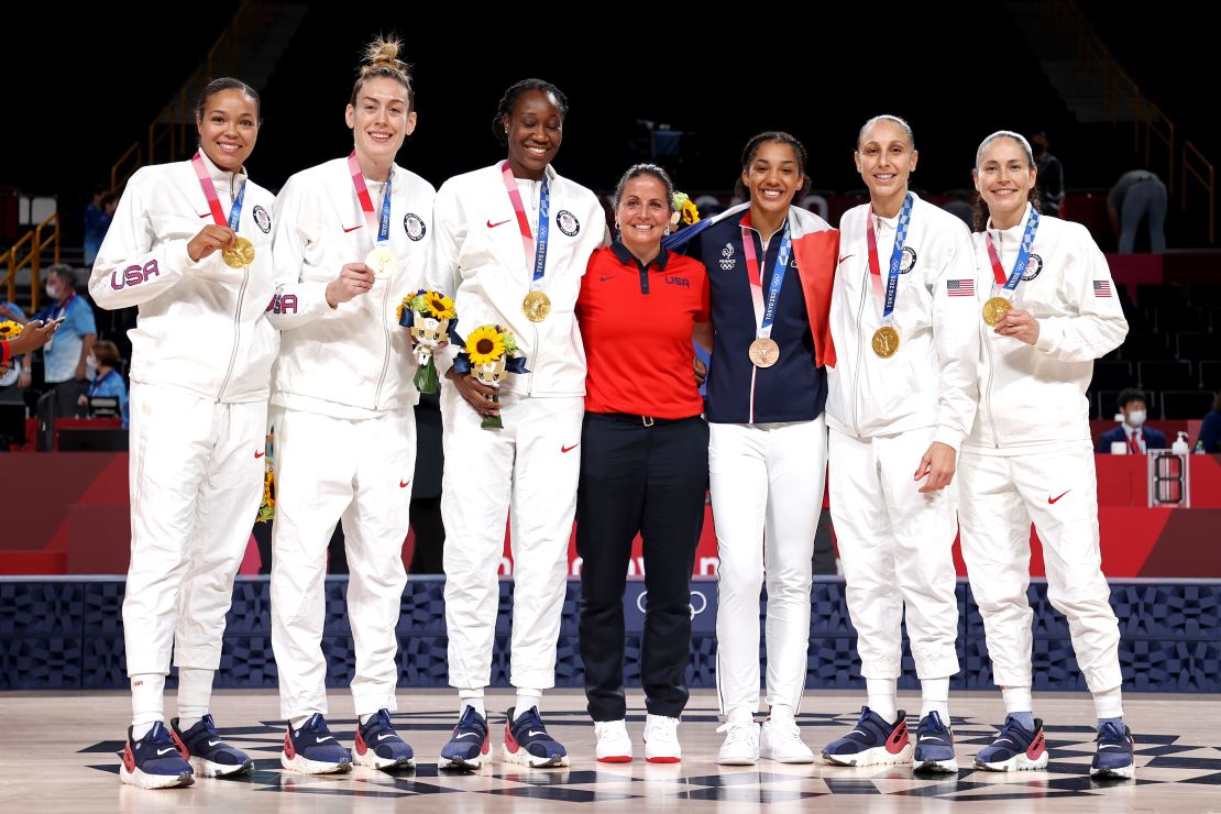 Collier and Stewart celebrate winning an Olympic gold medal in Tokyo alongside their Team USA teammates.