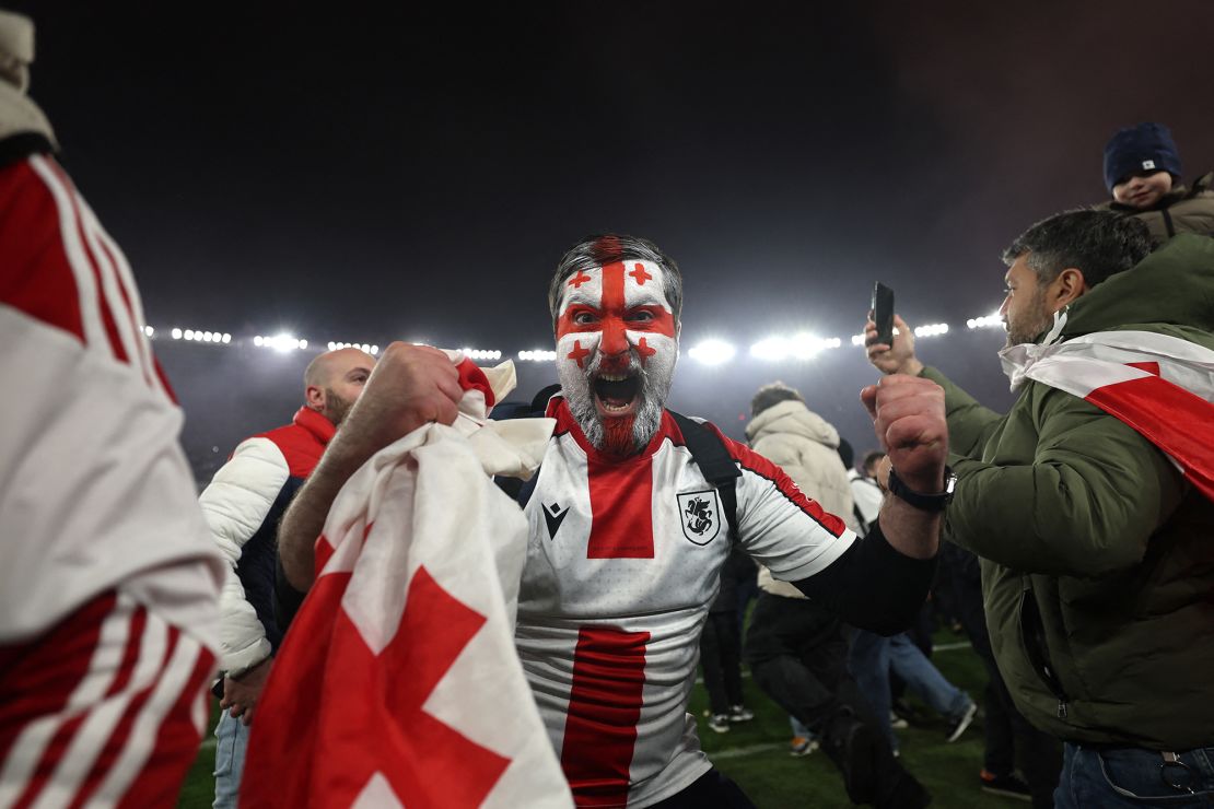 Georgia's fans invaded the pitch after the penalty shootout win.