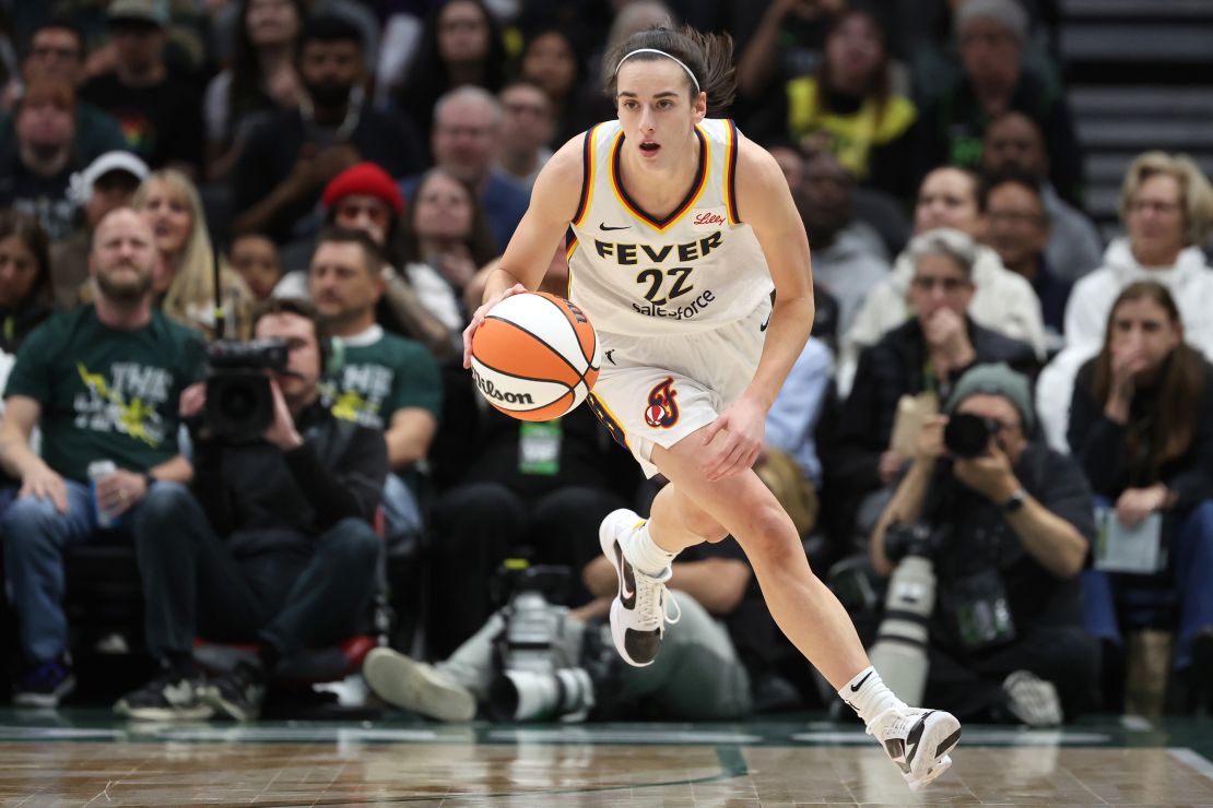 SEATTLE, WASHINGTON - MAY 22: Caitlin Clark #22 of the Indiana Fever dribbles the ball during the first quarter against the Seattle Storm in the game at Climate Pledge Arena on May 22, 2024 in Seattle, Washington. NOTE TO USER: User expressly acknowledges and agrees that, by downloading and or using this photograph, User is consenting to the terms and conditions of the Getty Images License Agreement. (Photo by Steph Chambers/Getty Images)